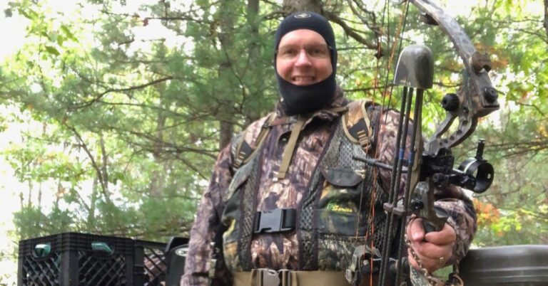Bow hunter wearing a Scent Loc Coverall for scent control