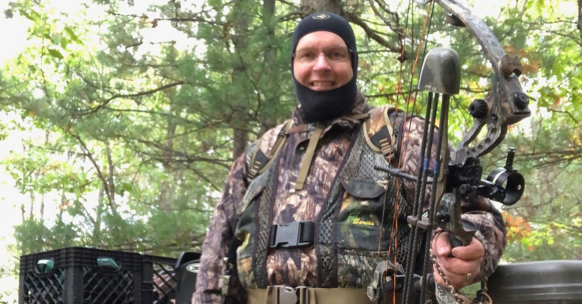 Bow hunter wearing a Scent Loc Coverall for scent control