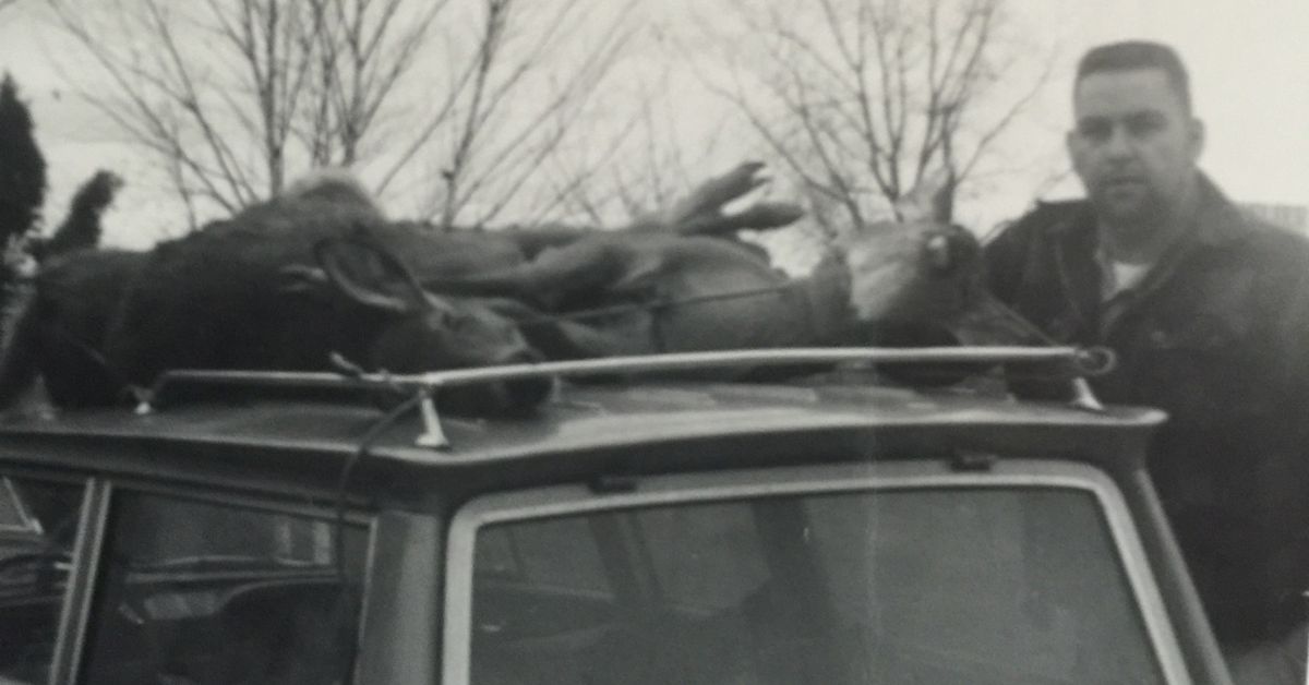 Hunter next to car with deer on roof overcomes hunting mistakes