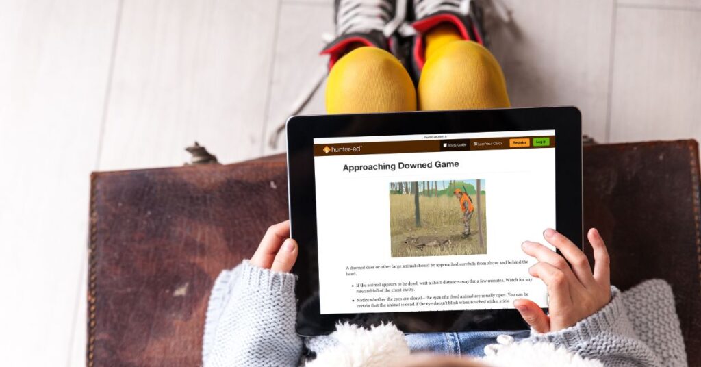 ipad with learning step about Approaching Downed Game during the hunt.