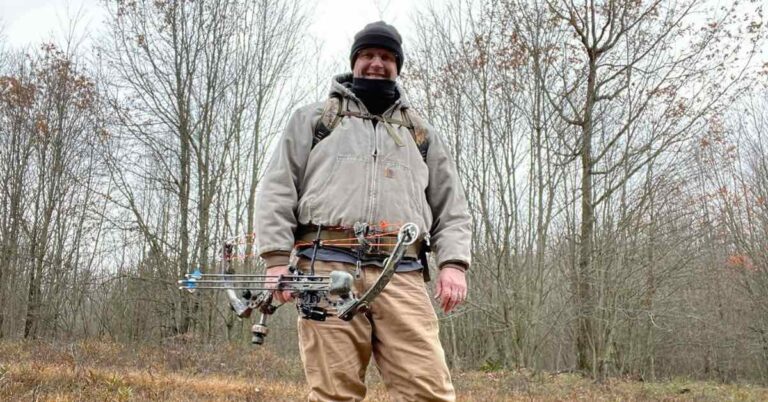Bow hunter wearing base layers