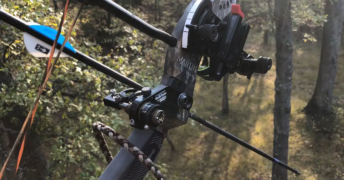 Closeup photo of compound bow and arrow