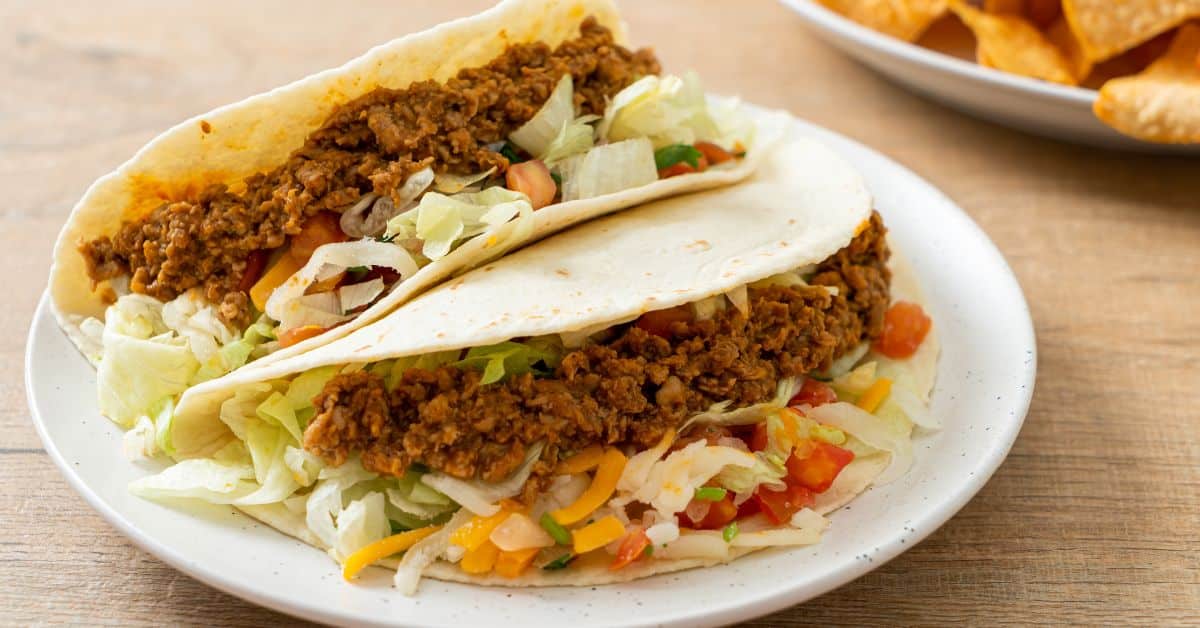 Ground Venison Tacos on tortillas with lettuce and cheese