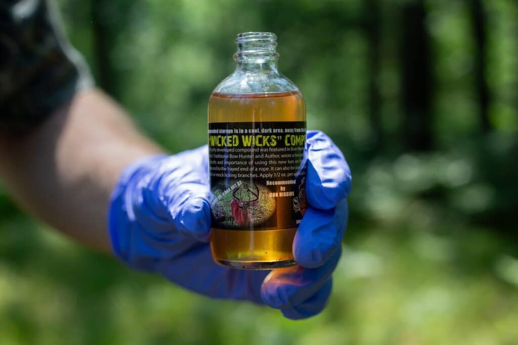 Bottle of Smokey's Buck Lure called Wicked Wicks Compound